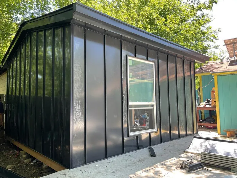 Black standing seam metal wall panels for Roof Inspection in Golden Gate